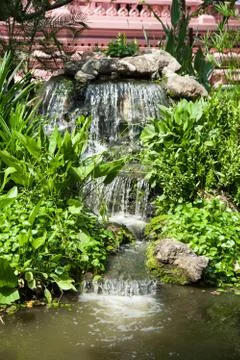 Waterfall in the park. Stock Photos