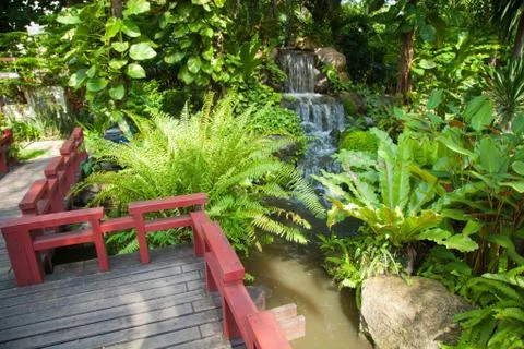 Waterfall in the park. Stock Photos