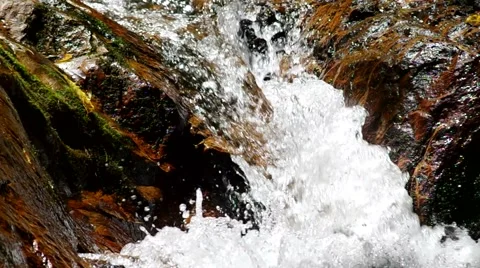 Waterfall pass through the rock Stock Footage 55799301