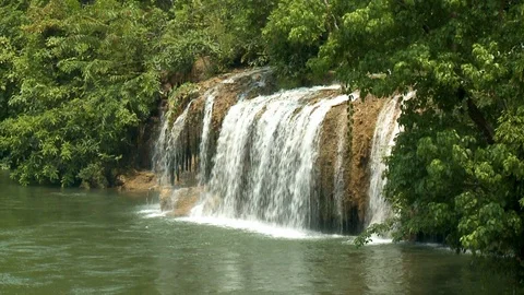 Waterfall in a peaceful setting Stock Footage 120017739