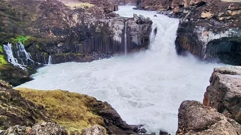 This waterfall plunges over volcanic basalt columns Stock Footage 340266959