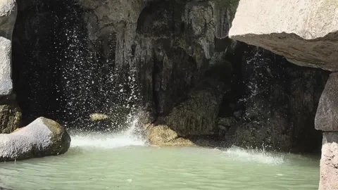 Waterfall Pool and Rock Grotto at Castle Hill in Nice Stockbeeldmateriaal 344052654