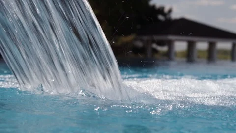 Waterfall in the pool close-up under the open sky. Stock Footage 115493282
