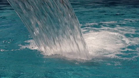Waterfall in the pool close-up under the open sky. Stock Footage 115493428