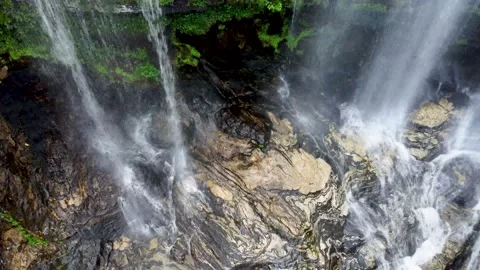 Waterfall from pool up to ledge Stock Footage 158324381