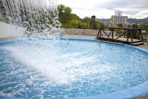 Waterfall into pool Stock Photos