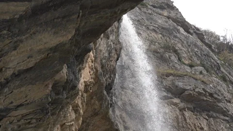 Waterfall Pouring Down Mountain Rocks Video stock 318846019