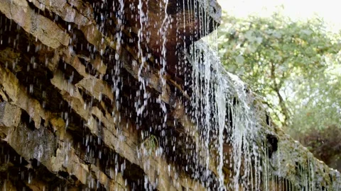 Waterfall Pouring over Rock Face Stock Footage 162189466
