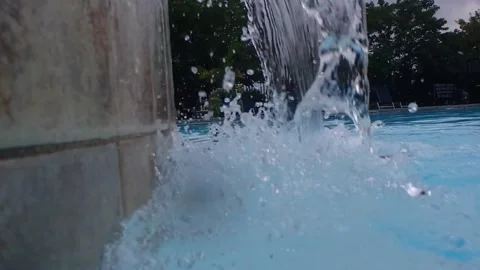 Waterfall pouring into pool Stock Footage 246391546