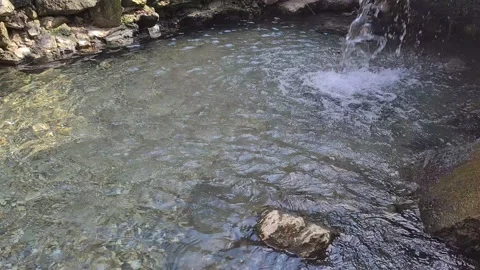 Waterfall Pours Into Small Pond Stock Footage 150315269