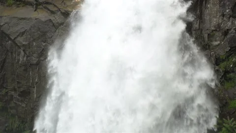 Waterfall with powerful stream of water falling down. Slow Motion Footage Stock Footage 122320662