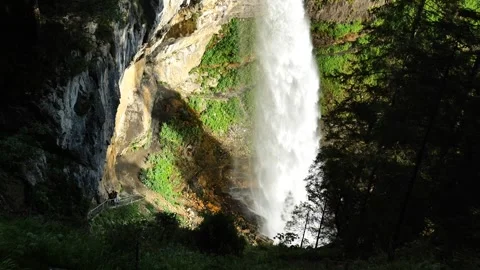 Waterfall. Powerful stream of a waterfall from a high cliff Stock Footage 263754602