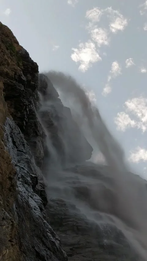Waterfall Powerfully Cascading Downward Low Angle Vertical 4K Stock Footage 315388765