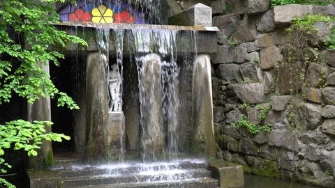 Waterfall in public park, fast streaming water. Stock Footage 107996124