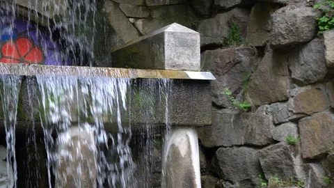 Waterfall in public park, fast streaming water. Stock Footage 107996191
