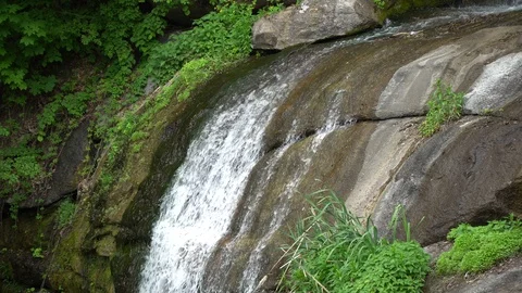 Waterfall in public park, fast streaming water. Stock Footage 107996353