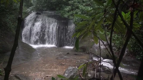 Waterfall in the rain mountain handheld rack focus mountain laurel 1 Stock Footage 76716806
