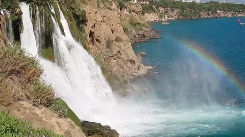 Waterfall with Rainbow over the Sea Stock Footage 55368136
