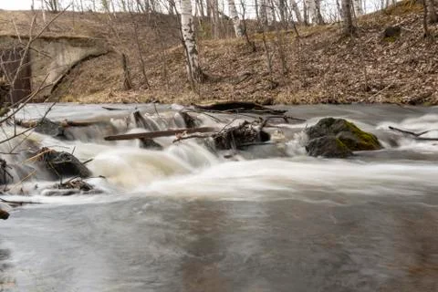 Waterfall Rapid flow of the river Long exposure photo Stock Photos