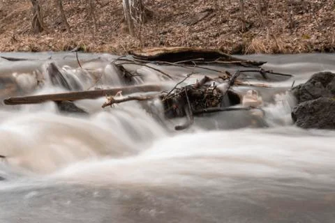 Waterfall Rapid flow of the river Long exposure photo Stock Photos