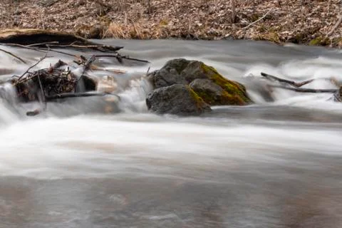 Waterfall Rapid flow of the river Long exposure photo Stock Photos