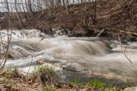 Waterfall Rapid flow of the river Long exposure photo Stock Photos