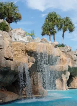 Waterfall at the Resort Pool Stock Photos