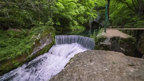 Waterfall Reveal in Krupajsko vrelo Stock Footage 130207111