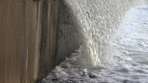 Waterfall on the river and a stone wall Stock Footage 36489461