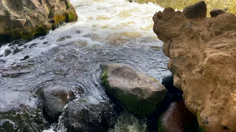 Waterfall from river. Mountain river with a waterfall and stones in lake. 스톡 동영상 218797714