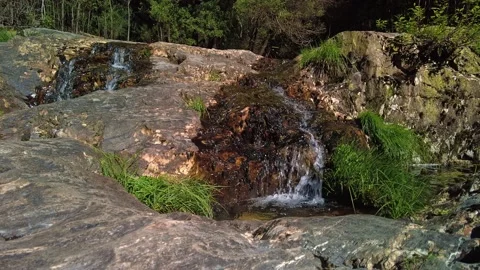 Waterfall from the river in the mountains. Streamflow on the rocks. Fresh water Stock-Footage 154392368