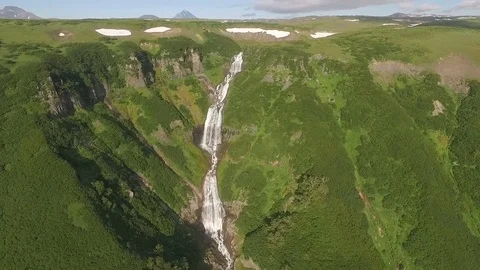Waterfall River Paradise Trees. A sweeping view over a large waterfall Stock Footage 73660486