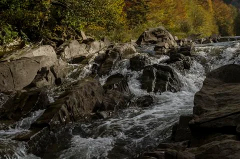Waterfall on the river in the sun Foto stock