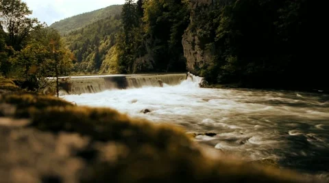 Waterfall riverside ecosystem green nature energy Stock-Footage 64539176