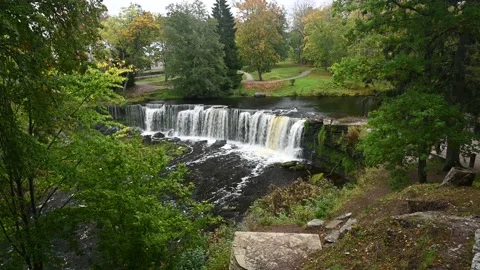 Waterfall with roaring and foaming water in Keila Joa park in autumn. Stock Footage 236011822
