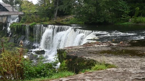 Waterfall with roaring and foaming water in Keila Joa park in autumn. Stock Footage 236011952