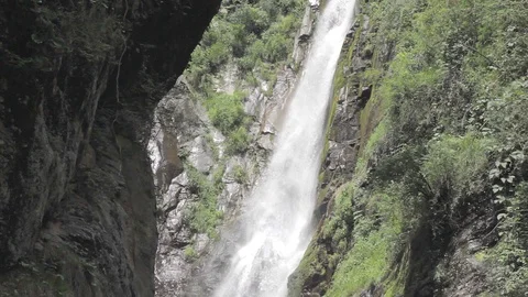 A waterfall on a rock Stock Footage 95327241