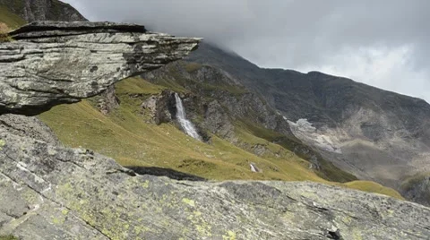 Waterfall with rock in front Stock Footage 8666200