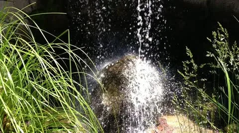 Waterfall on a rock in a river Stock Footage 11135666