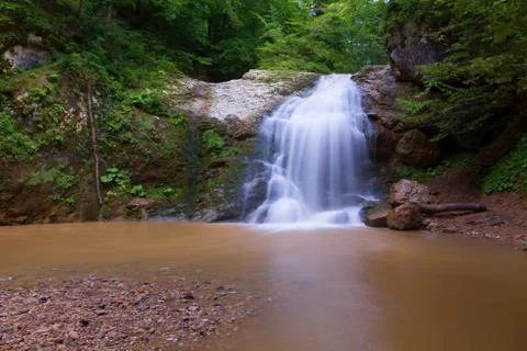 Waterfall rocks forest Stock Photos