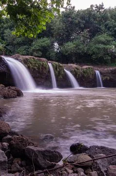 Waterfall with rocks Stock Photos