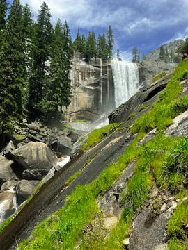 Waterfall with Rocky Cliff Stock Photos