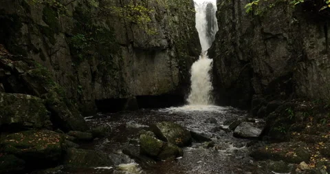 Waterfall in a rocky gorge Stock Footage 220221193