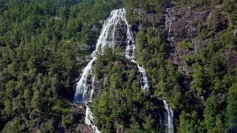 Waterfall in a rocky landscape Stock Footage 239551810