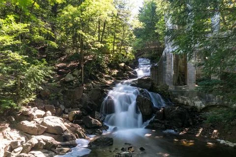 Waterfall by ruins Stock Photos