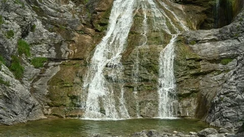 A waterfall runs into a pool, Glasbach Wasserfall, Bavaria Stock-Footage 288464733