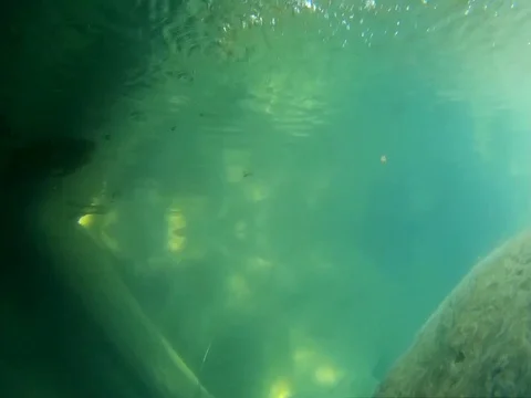 Waterfall seen from a pool under water in Semuc Champey, Guatemala. Stock Footage 100645098