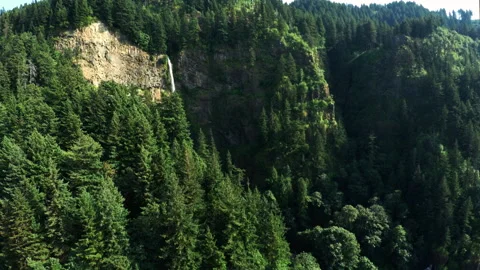 Waterfall off the side of a cliff Stock Footage 154931618