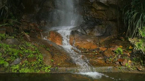 Waterfall sideshot slow motion Stock Footage 168387907