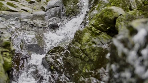 Waterfall in Slow Motion - Rack Focus and strange rock formation #2 Stock Footage 90627993